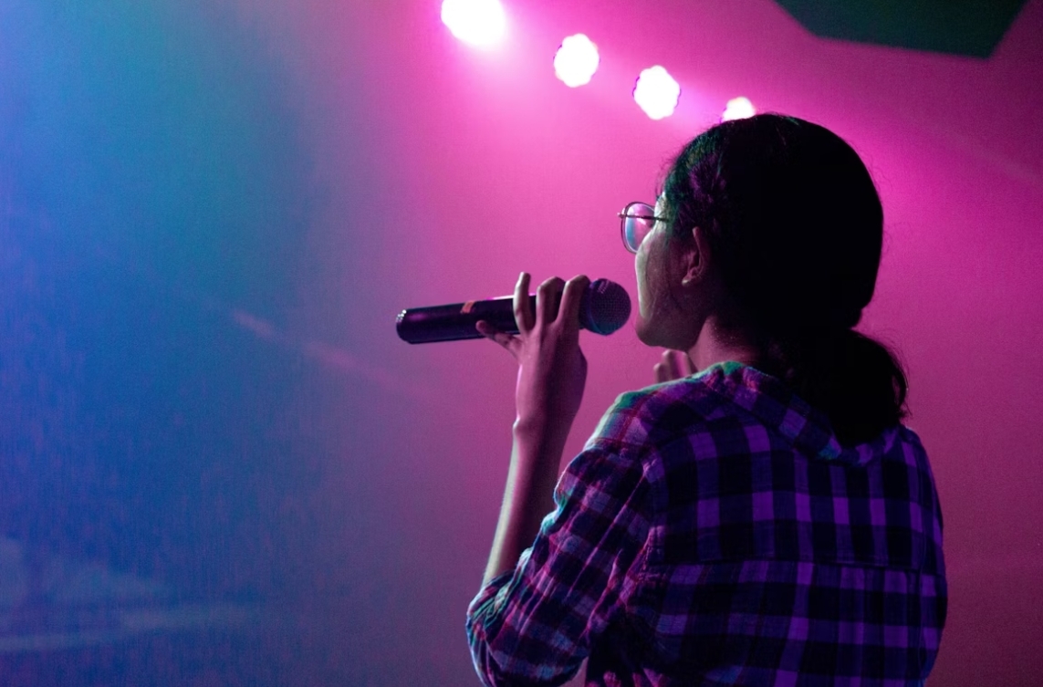 Karaoke singer performing at party