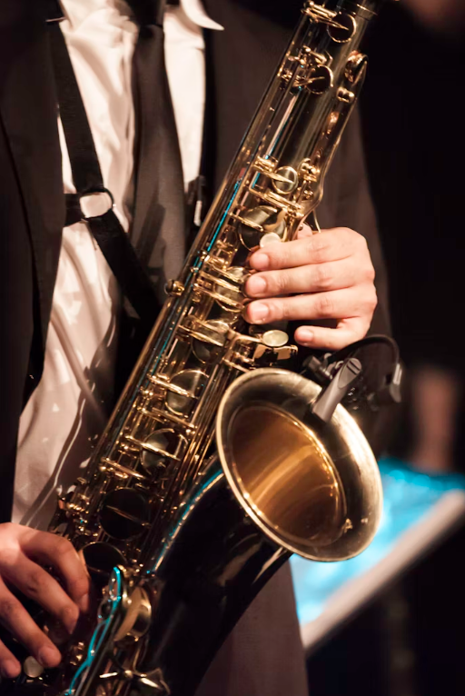 Saxophonist playing at an outdoor event