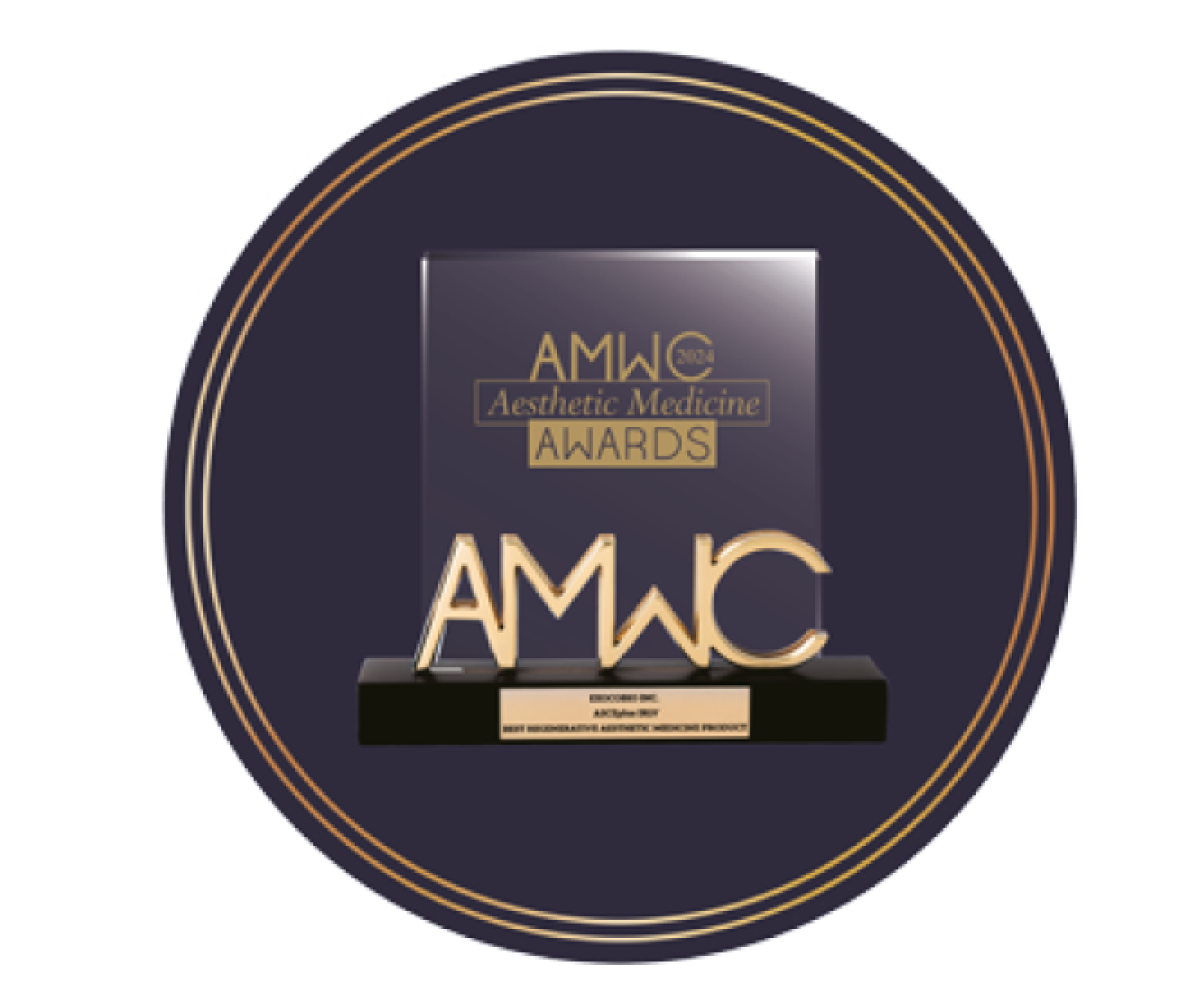 AMWC Aesthetic Medicine Awards 2024 trophy on a dark circular base.